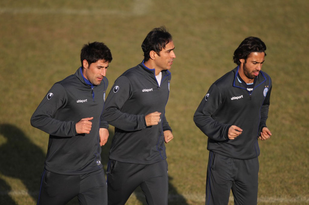 Senior Players playering Soccer Image